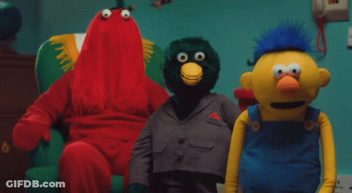 Group Of Stuffed Animals Red And Green Bird GIF