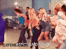 Group Of Women Dancing Bend And Snap GIF