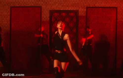 Group Of Women Dancing In Dark Room GIF