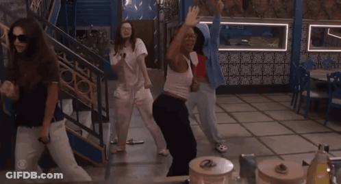 Group Of Women Dancing In Room With Green Couch GIF