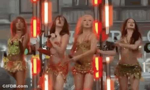 Group Of Women Dancing On Stage GIF