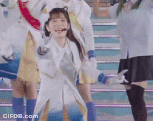 Group Of Women Dancing One In Cat Costume GIF