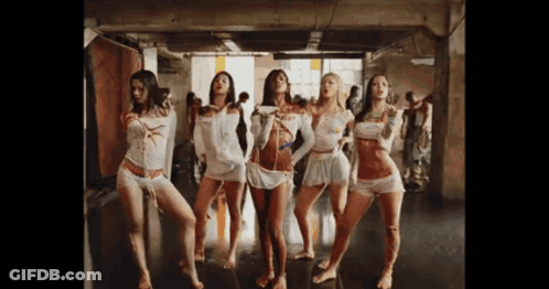 Group Of Women Dancing One In White Top GIF
