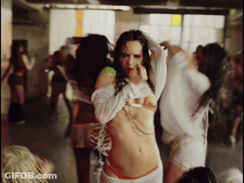 Group Of Women Dancing One With Chest Tattoo GIF