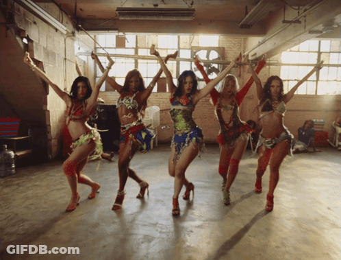 Group Of Women Dancing With Arms Outstretched GIF