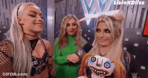 Group Of Women Holding Puppet And Smiling GIF