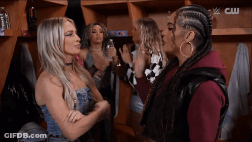 Group Of Women In Locker Room With CW Logo GIF