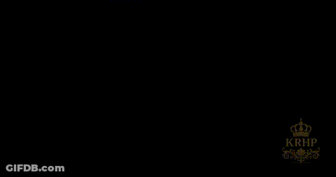 Group Of Women Standing Around Candlelit Table In Dark GIF
