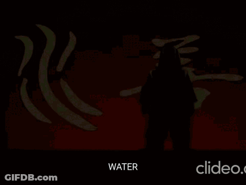 Group Of Women Standing In Front Of Flowers GIF