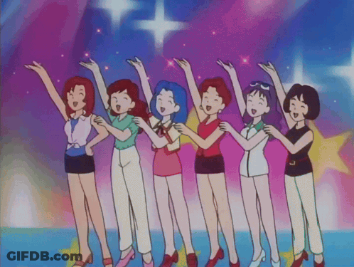 Group Of Women Standing With Arms In Air GIF