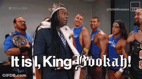 Group Of Wrestlers One Wearing King Crown GIF