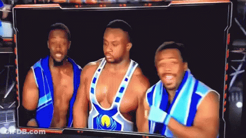 Group Of Wrestlers Standing Together GIF