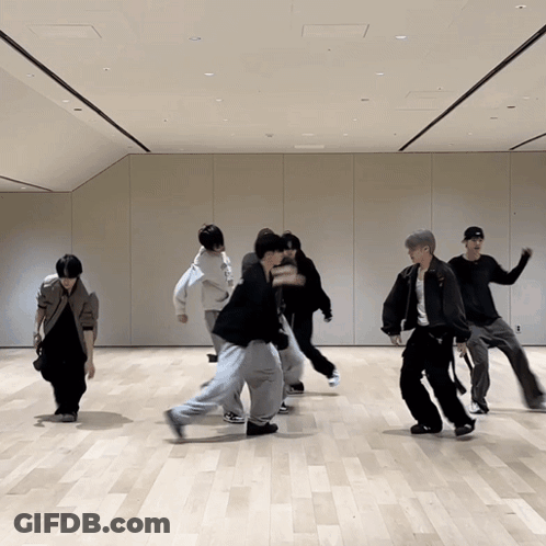 Group Of Young Men Dancing In Room GIF