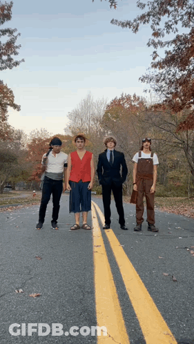 Group Of Young Men In Costumes GIF
