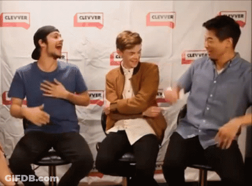 Group Of Young Men In Front Of Clevver Wall GIF