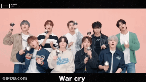Group Of Young Men In Front Of Pink Background War Cry GIF