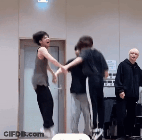 Group Of Young Men Jumping In The Air GIF