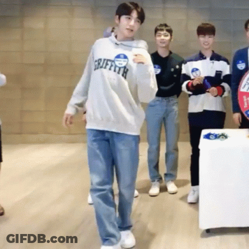 Group Of Young Men One Wearing Griffith Sweatshirt GIF