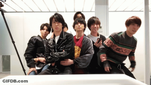 Group Of Young Men Posing In Front Of Mirror GIF