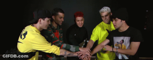 Group Of Young Men Putting Hands Together GIF