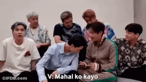 Group Of Young Men Sitting GIF