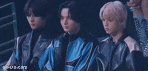 Group Of Young Men Sitting In A Row GIF