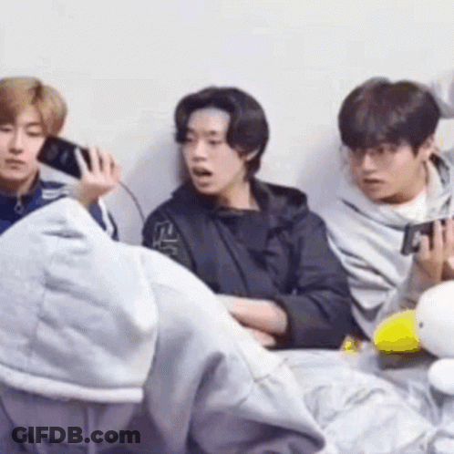 Group Of Young Men Sitting Next To Each Other On Couch GIF