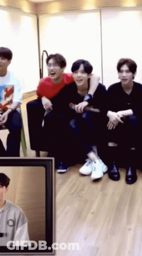 Group Of Young Men Sitting On Couch Laughing GIF