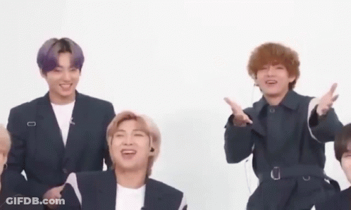 Group Of Young Men Sitting Together GIF