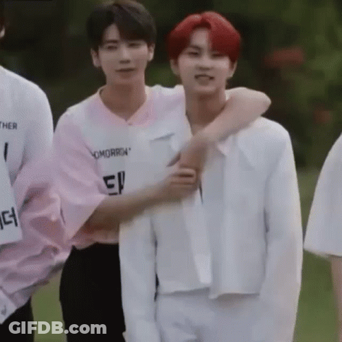 Group Of Young Men Standing Together GIF