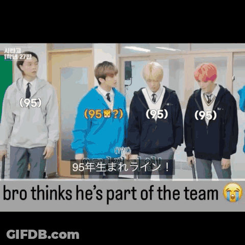 Group Of Young Men Standing Together One Says He's Part Of The Team GIF