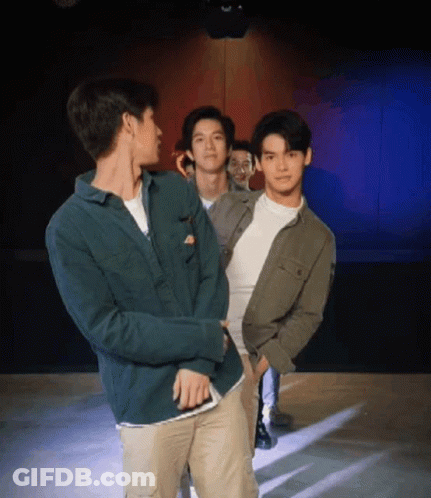 Group Of Young Men Standing Together GIF