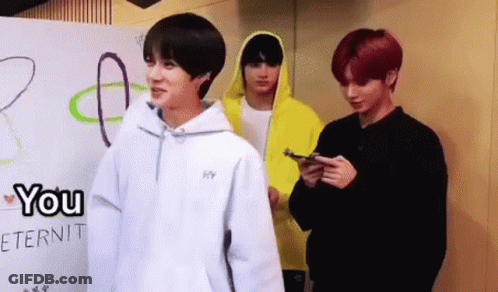 Group Of Young Men Standing Together GIF
