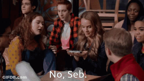 Group Of Young People Sitting Around Table Saying No Seb GIF