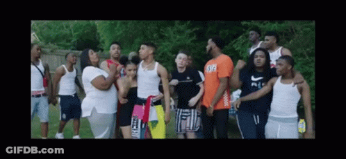 Group Of Young People Standing In Field GIF