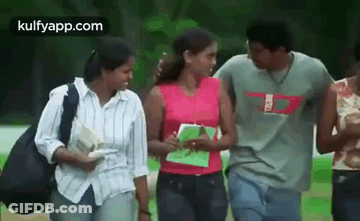 Group Of Young People Walking Down Sidewalk GIF