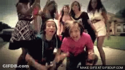 Group Of Young Women Dancing In Park GIF