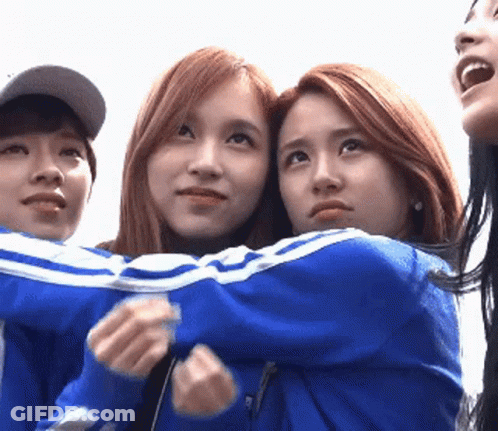 Group Of Young Women Posing For Picture GIF