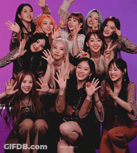 Group Of Young Women Posing On Purple Background GIF