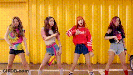 Group Of Young Women Standing In Front Of Yellow Wall GIF
