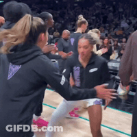 Group On Basketball Court One In Black Hoodie GIF