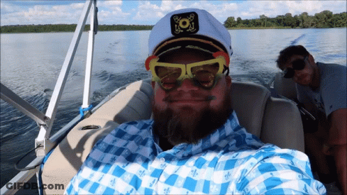 Group On Boat Holding American Flag And Sign Me Up Sign GIF