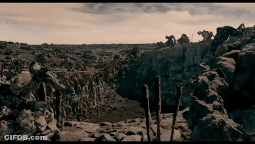 Group On Rocky Cliff Overlooking River GIF
