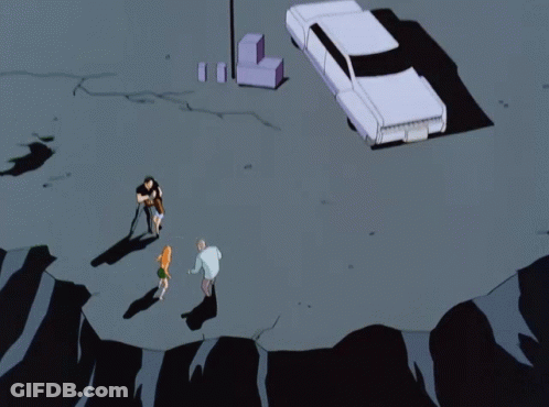 Group On Rocky Cliff With Purple Box GIF