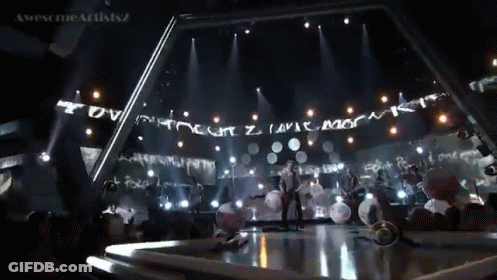 Group On Stage Saying Awesome Artists GIF