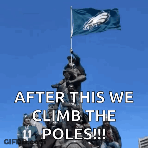Group On Statue Holding Flag Saying After This We Climb The Poles GIF