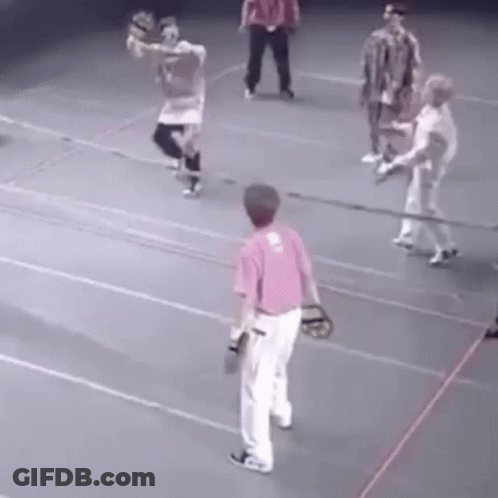 Group Playing Baseball On Court GIF