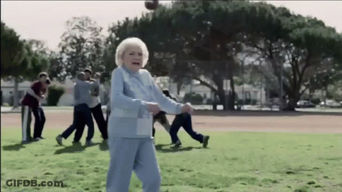 Group Playing Baseball With Elderly Woman GIF