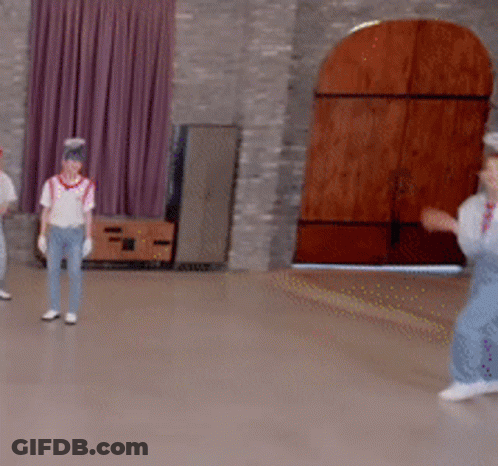Group Playing Game In Room With Wooden Door GIF