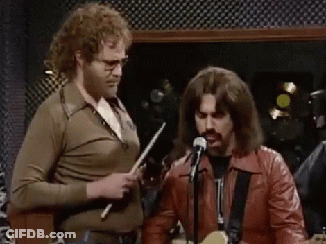 Group Playing Guitars And Singing Into Microphones GIF